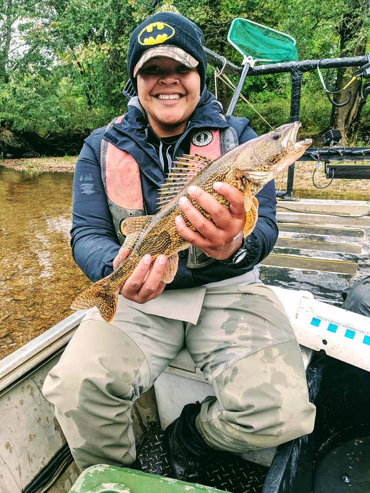 Brittany with Sauger (Sander canadensis). Photo credit: Dustin Thomas