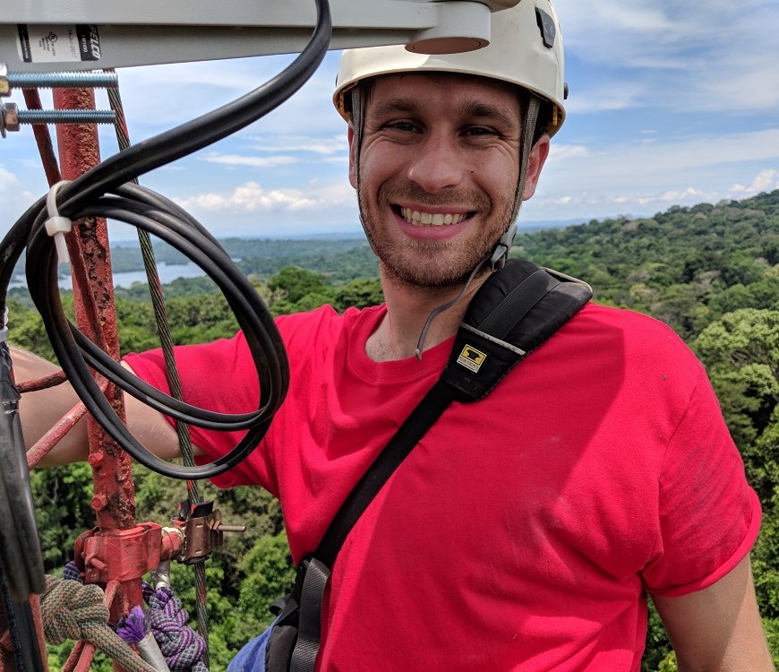 Evan on a tower (also on BCI) doing repairs on equipment for a different project (photo credit: Jeffrey Burchfield).