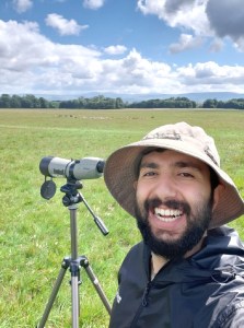 Bawan Amin in the field with a telescope tracked on fallow deer