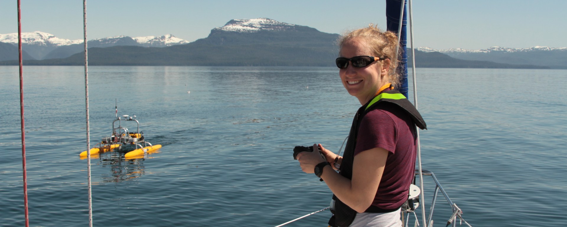 Ellen Chenoweth uses a prey mapping robot to measure the distribution of hatchery salmon after a release at Hidden Falls Hatchery in Alaska.