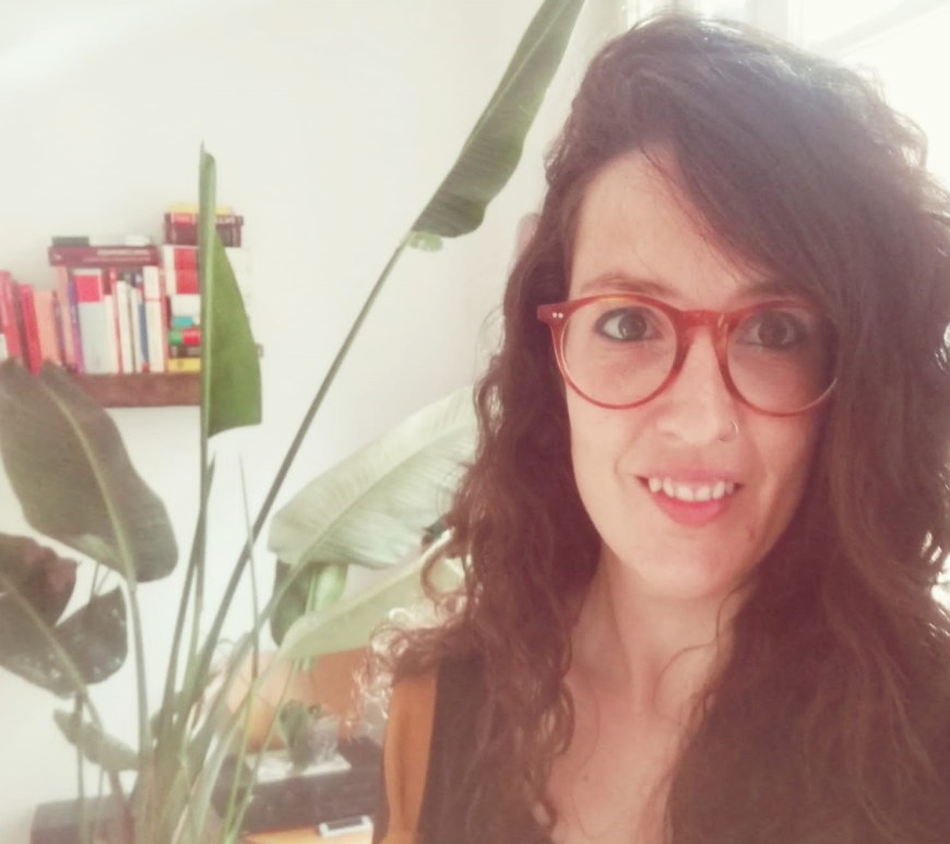 Teresa Rosas working in their COVID-19 office